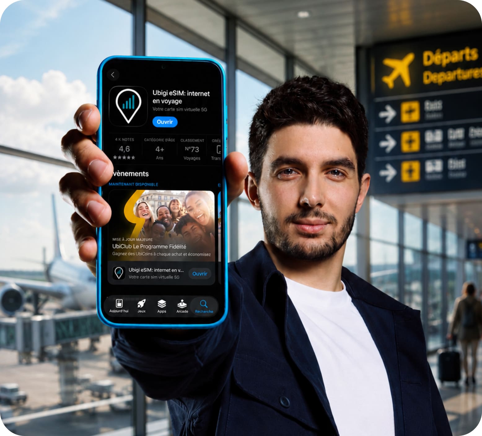 Esteban Ocon showing the Ubigi eSIM app on the App Store