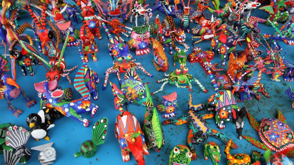 Don't forget to buy the handmade wooden alebrijes